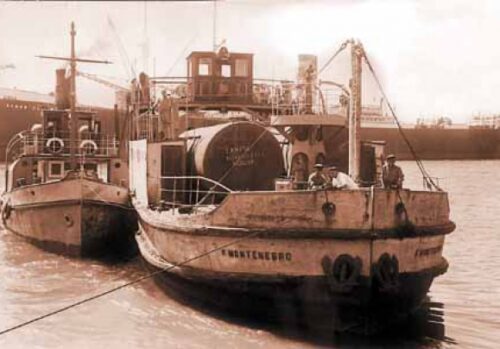 Ferry Francisco Montenegro and tug San Mart&iacute;n, 1955